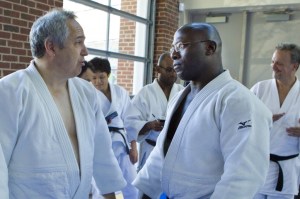 Host Terence McPartland from DC Judo coordinates with Dr Rhadi Ferguson