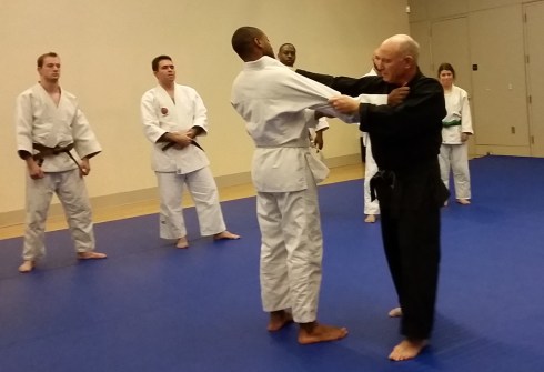 A thumb to the neck provides excellent kuzushi (off balancing)