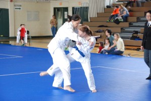 Jennifer Dippel (Jason Morris Baltimore) attempts ouchi-gari on Jenae Michelle (DC Judo)